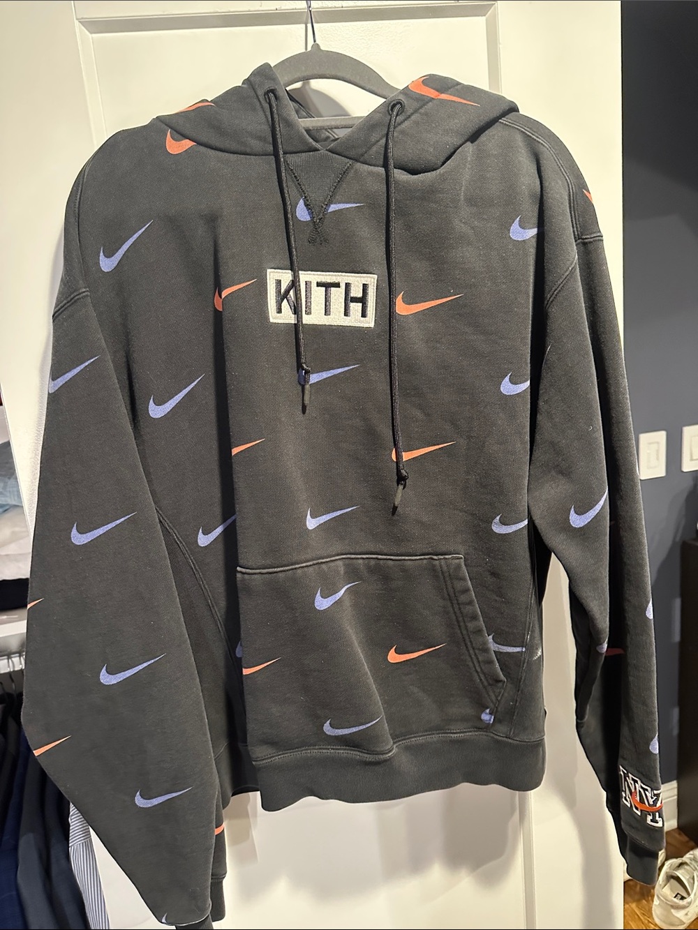 Kith Black Hoodie with Blue & Orange Swoosh All-Over Print